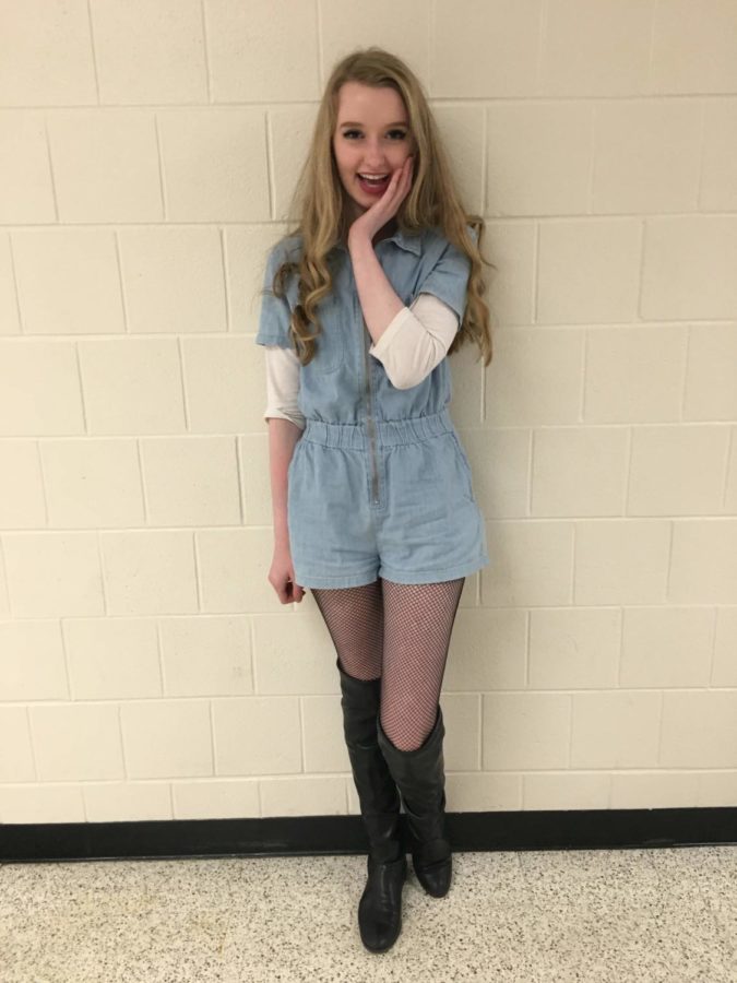 Sophomore Maria Coyle displays a creative style with a jean romper and fishnet leggings.