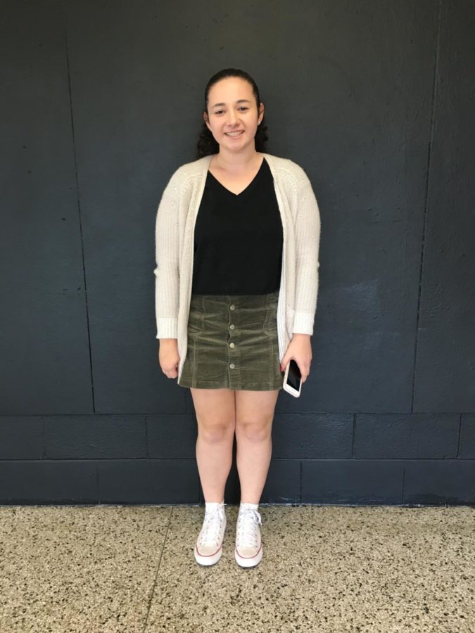 Lily Freedman, a sophomore, wears a jean skirt with Converse creating a trendy appearance.
