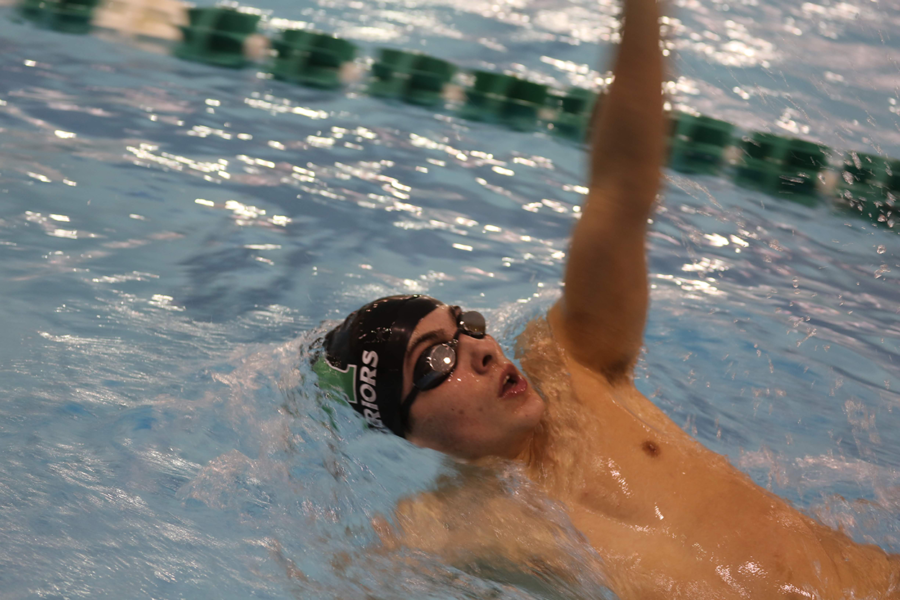 Senior Will Tornambe swims backstroke during the 200 IM against Phoenixville. 
