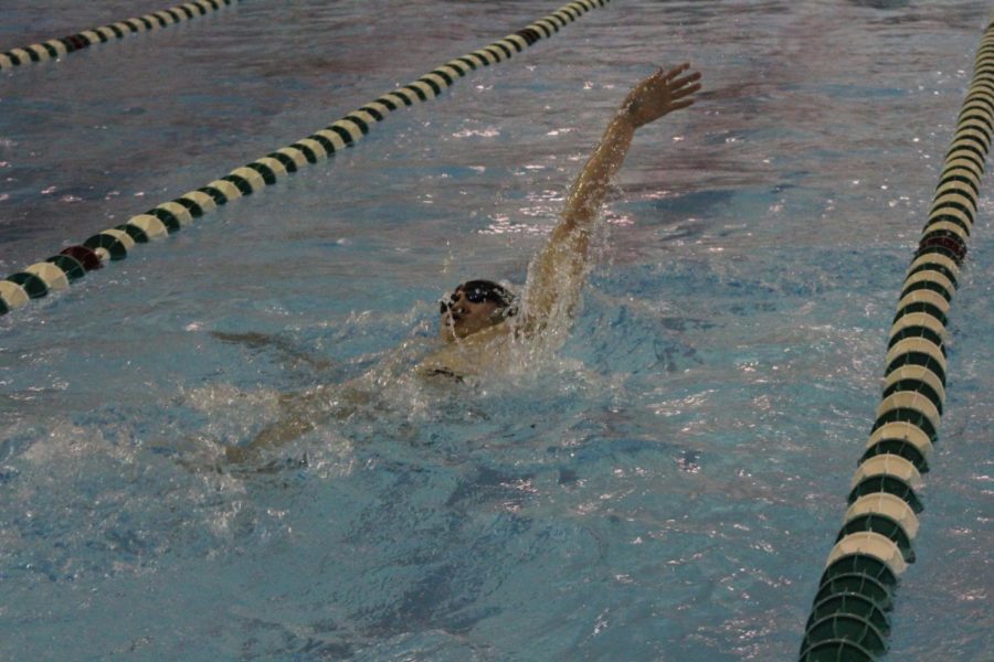 Dylan Phan earned a personal record and second place in 100 backstroke. 
