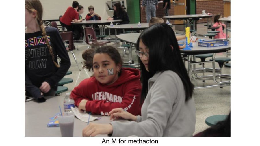 Multicultural Club students painted kids faces in the cafeteria. 