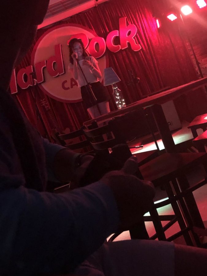 Caitlin Elysia Alano sang a couple of songs in the Hard Rock Cafe themed coffeehouse. 

