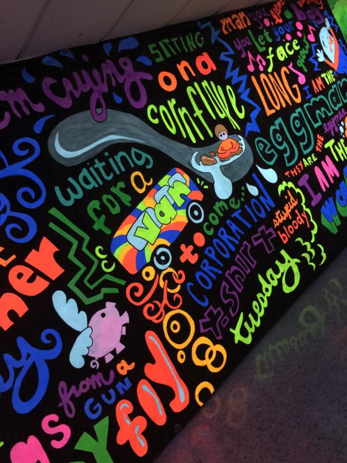 One of the Beatles themed murals was in the “blacklight hallway”. 
