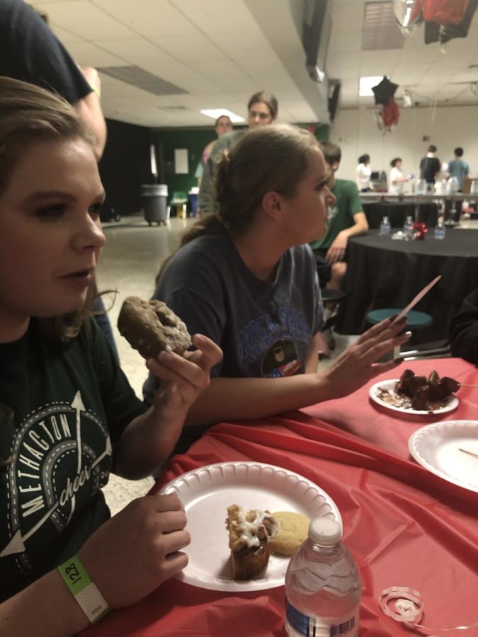 Bridget Donnelly-Marchese and Deena Drager enjoy some of the food in the cafeteria. 
