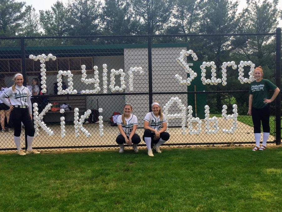 (from left) Seniors Taylor Angelillis, Kiki Hamilton, Abby Penjuke and Sara Markley stand by their corresponding names to commemorate their win as well as their final season as Warriors.
