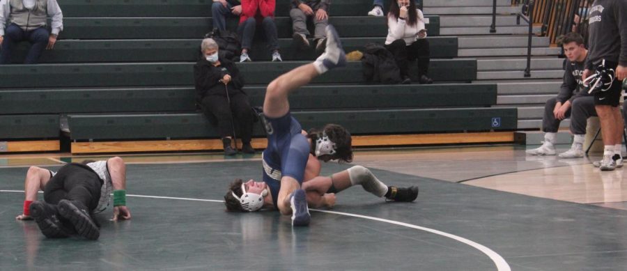 Methactons Joey Simko pins Justin Miller to earn the victory for the Warriors. 
