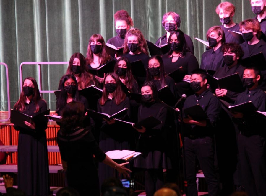 The soprano section of jazz choir sings Let it Snow during the concert on Dec. 22 at Arcola Middle School.