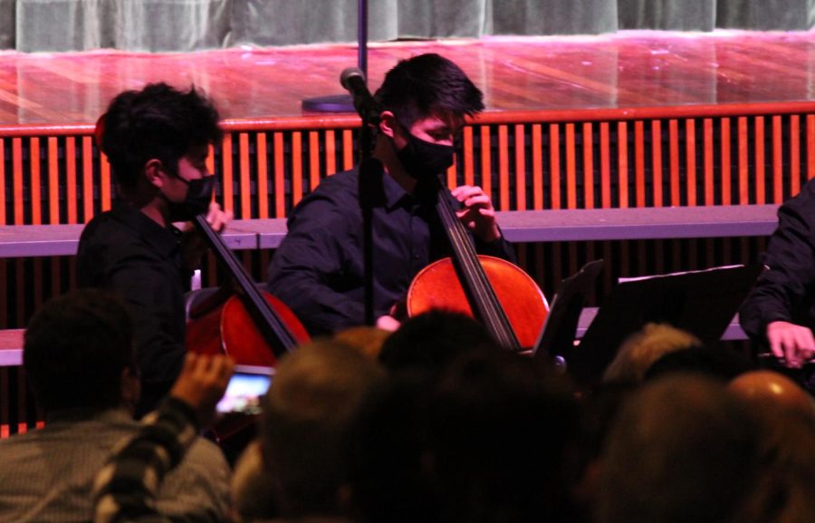 Cellists Nathan Choi and Owen Li, members of the cello ensemble, perform La Rejouissance.