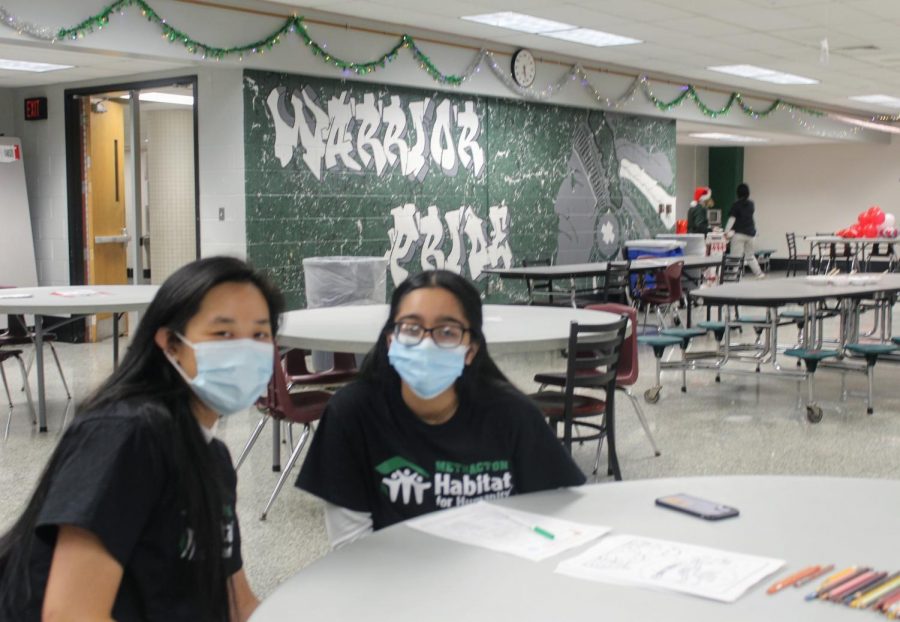 Anna Lu and Deepali Panchi work together at the coloring station.
