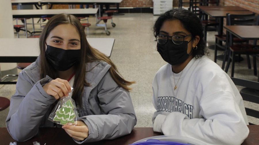 Seniors Allison Masciantonio and Josephine James came to volunteer and sell cookies at the event.
