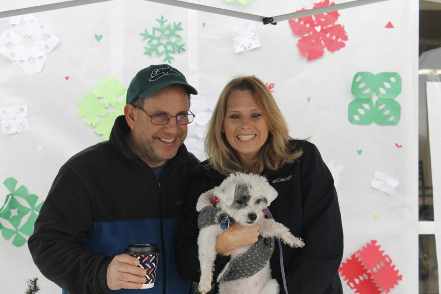 The Masciantonio family posed with their dog Mia at the event in support of local rescues and shelters.
