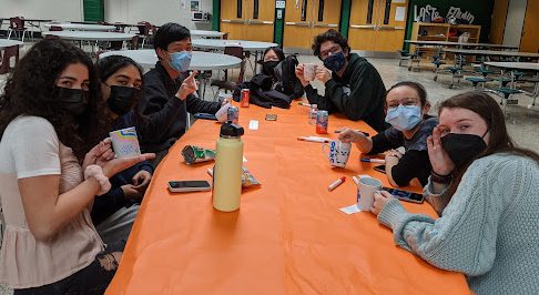 Students painted a variety of designs on their mugs at the Feb. 11 event that raised money for the Clean Air Act Council. The mugs were usable, after a one-hour heating process.