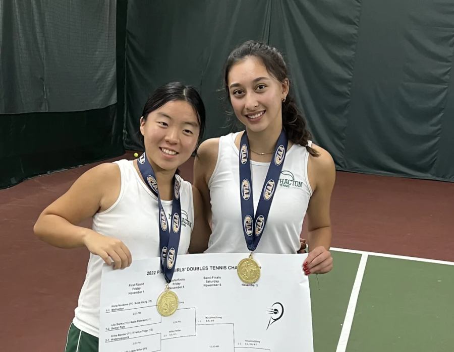 Proud Methacton champs hold up the 2022 PIAA 3A Girls’ Doubles Tennis Champion bracket.