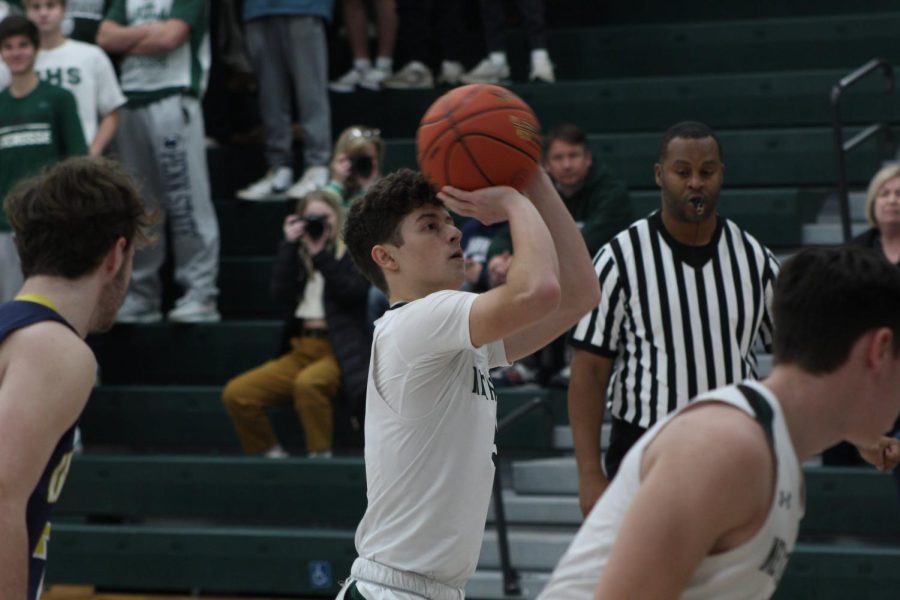 Senior Jason Lagana shoots a pair of free throws after being fouled.
