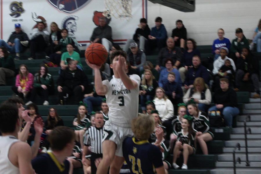 Senior Jason Lagana elevates for a lay up.
