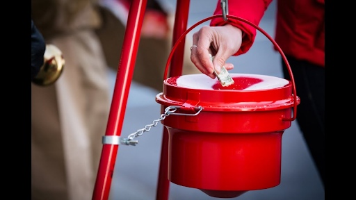 Pedestrians going by choose to donate for the Norristown Salvation Army for the holidays.