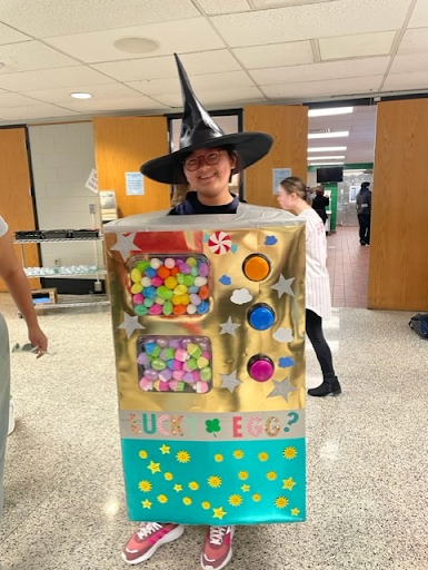 Overall costume contest champion Suhyun Park poses in her egg machine costume. The costume was able to win her the designation of most popular in the school.
