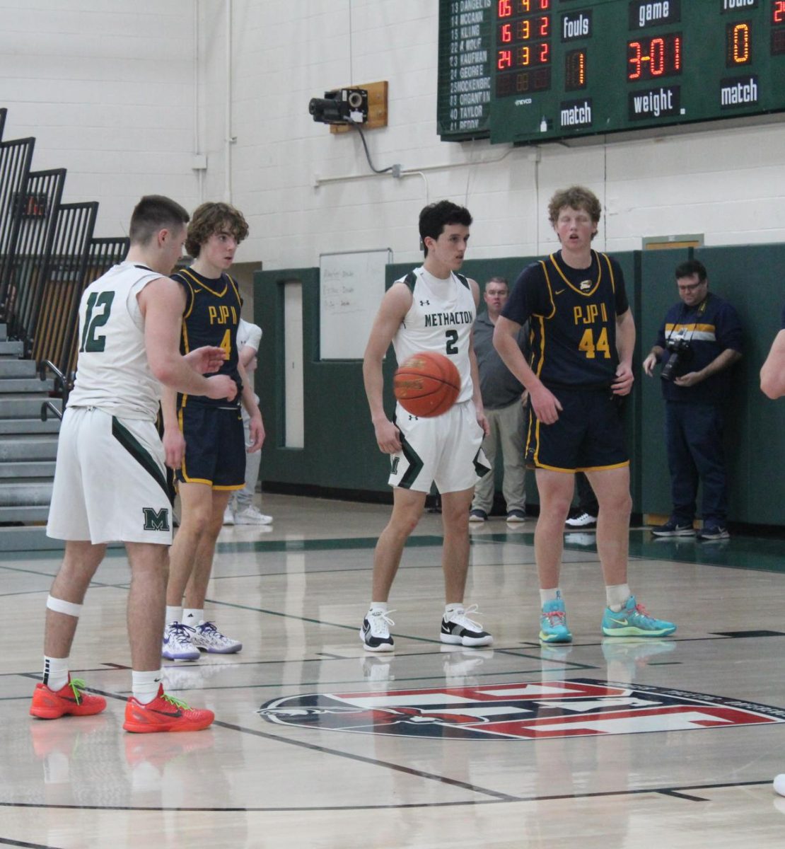 Senior Sal Iemmello receives the ball from the ref prior to foul shot. Iemmello finished the evening with 21 points.  
