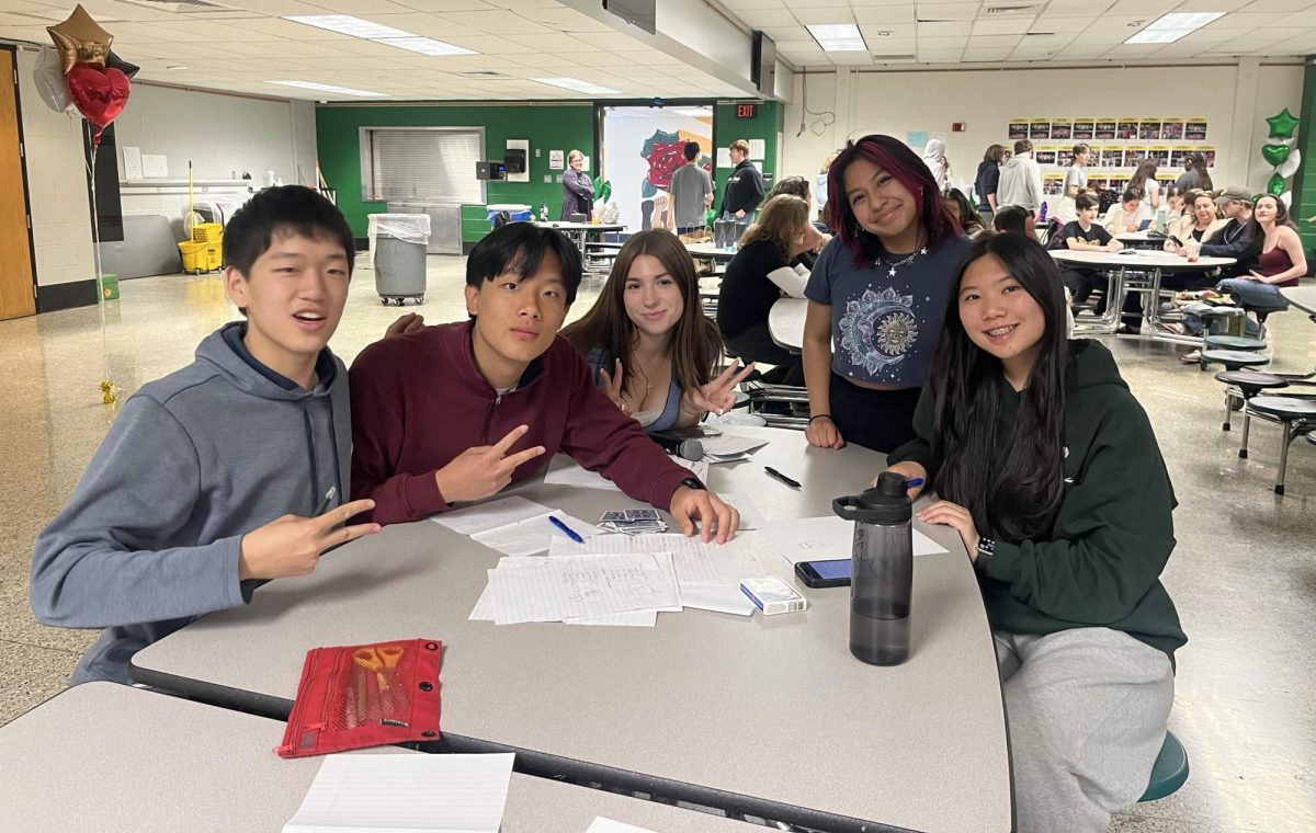 (From left); Jeffrey Fan, Gilbert Yang, Cece Cavallo, Ayro Coppola, Jenny Jiang gathered to play trivia during the Trivioke night on May 15.
